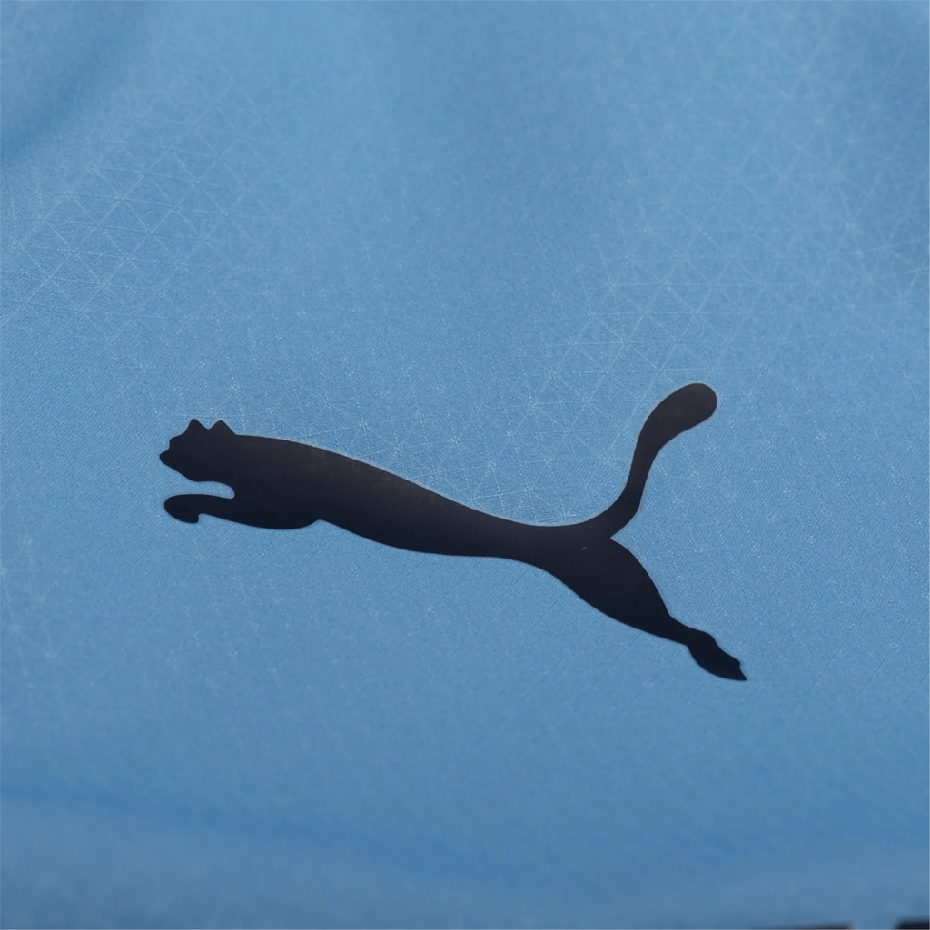 Puma Maglia Home Manchester City Erling Haaland con patch Champions League 25/26 (Team Light Blue/Bianco)